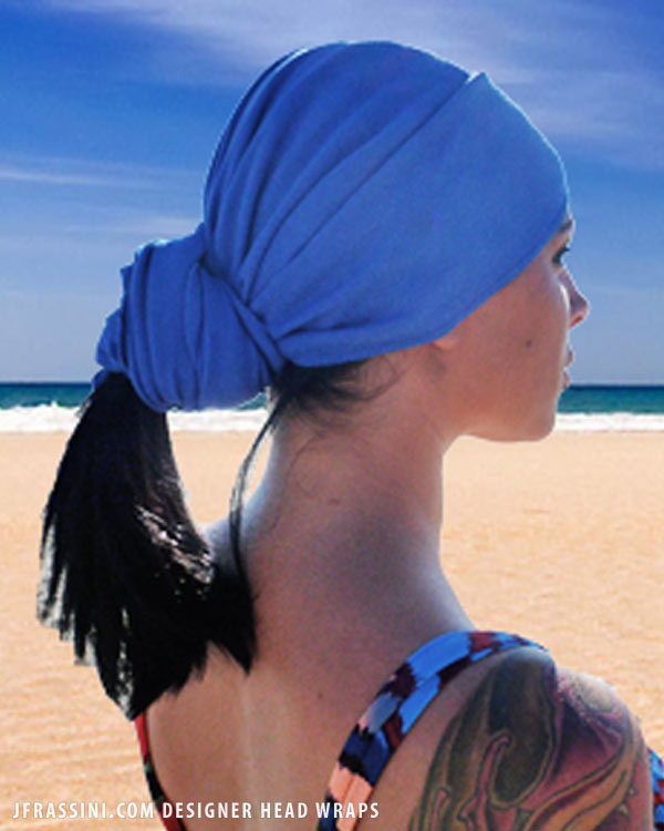 Enjoying the ocean breeze in an egyptian blue head wrap.